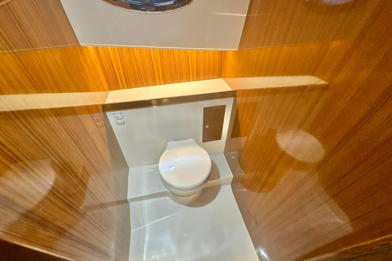 Slide: The Image of Luxurious bathroom interior of 2024 DaVinci 30HT yacht with wooden paneling. - 47
