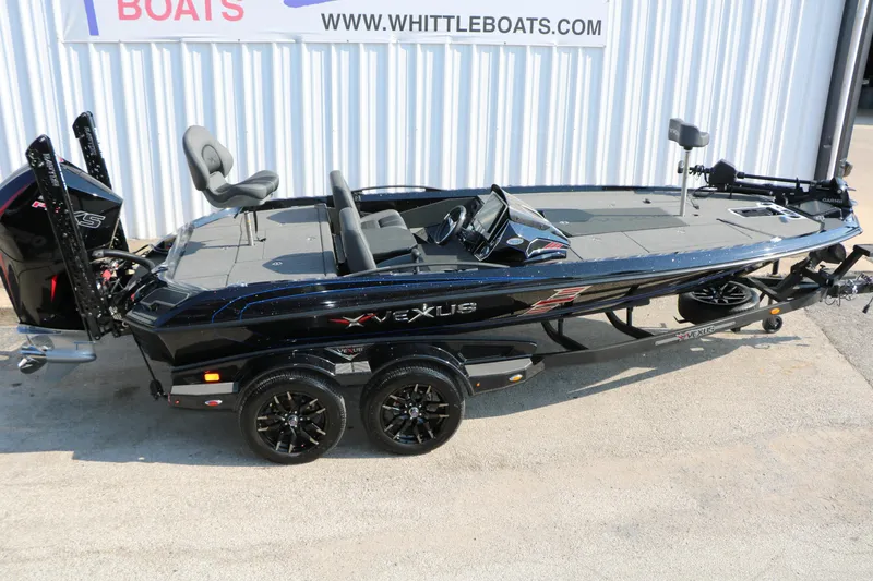 Slide: The Image of 2024 Vexus VXS 20 boat on trailer, black exterior, displayed at Whittle Boats dealership. - 16