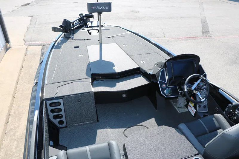 Slide: The Image of 2024 Vexus VXS 20 boat interior with modern dashboard and spacious deck. - 19