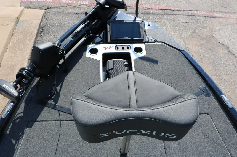 Slide: The Image of 2024 Vexus VXS 20 boat cockpit with Garmin electronics and comfortable seating. - 27
