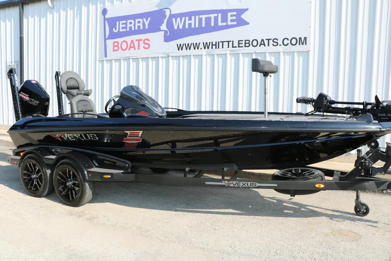 Slide: The Image of 2024 Vexus VXS 20 boat displayed at Jerry Whittle Boats dealership. - 3