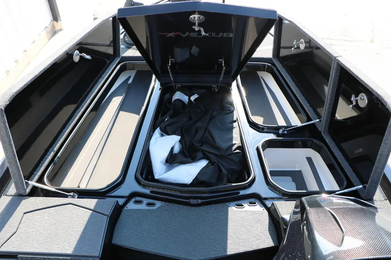Slide: The Image of 2024 Vexus VXS 20 boat storage compartments open, showcasing spacious interior design. - 36