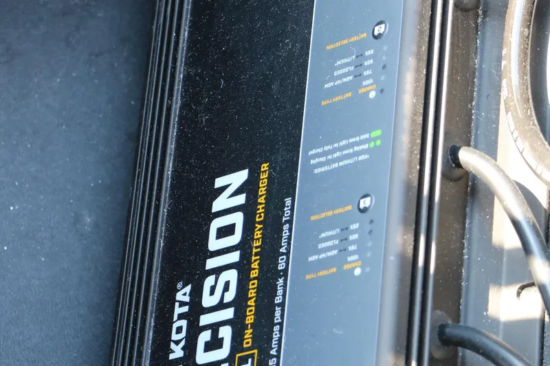 Slide: The Image of 2024 Vexus VXS 20 onboard battery charger, detailed view of controls and indicators. - 40