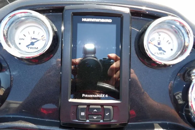 Slide: The Image of Dashboard of a 2013 Lowe Stinger ST175 with Humminbird PiranhaMAX 4 display. - 13
