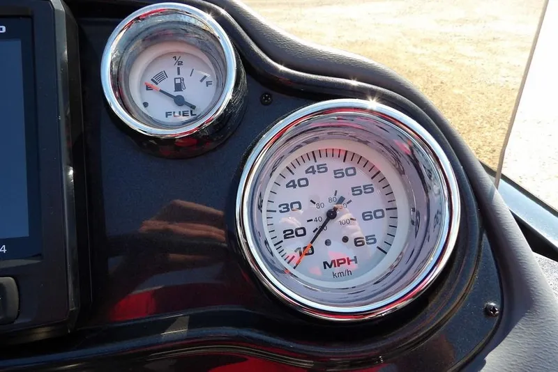 Slide: The Image of Dashboard of 2013 Lowe Stinger ST175 with fuel and speed gauges. - 20