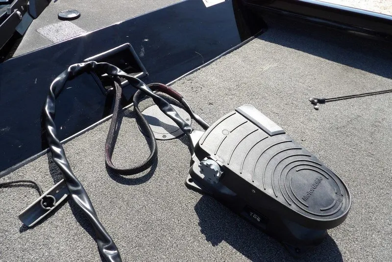 Slide: The Image of Foot pedal control on 2013 Lowe Stinger ST175 boat deck. - 32