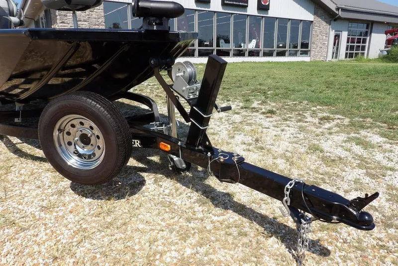 Slide: The Image of Trailer hitch of a 2013 Lowe Stinger ST175 boat, parked on gravel. - 34