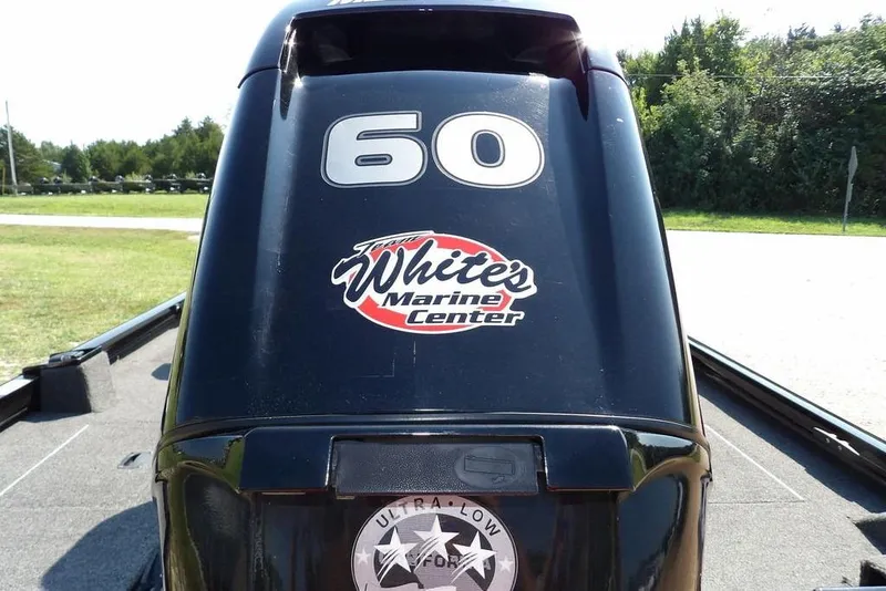 Slide: The Image of 2013 Lowe Stinger ST175 boat engine with "White's Marine Center" logo. - 41