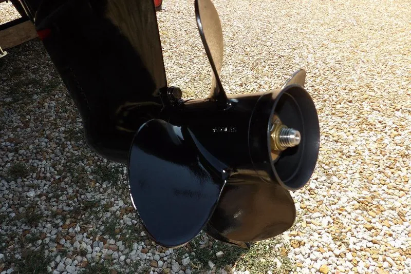 Slide: The Image of Propeller of 2013 Lowe Stinger ST175 boat on gravel surface. - 43