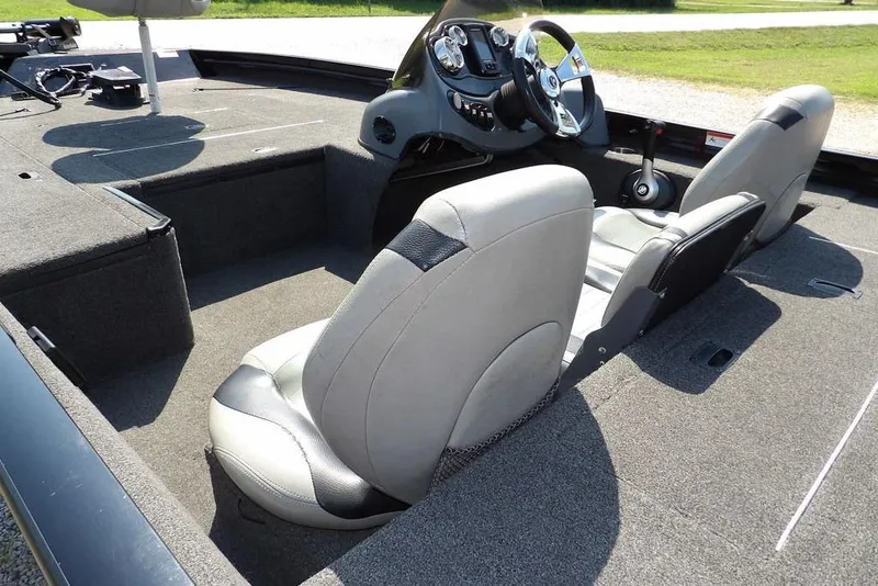 Slide: The Image of 2013 Lowe Stinger ST175 boat interior with dual seats and steering console. - 8