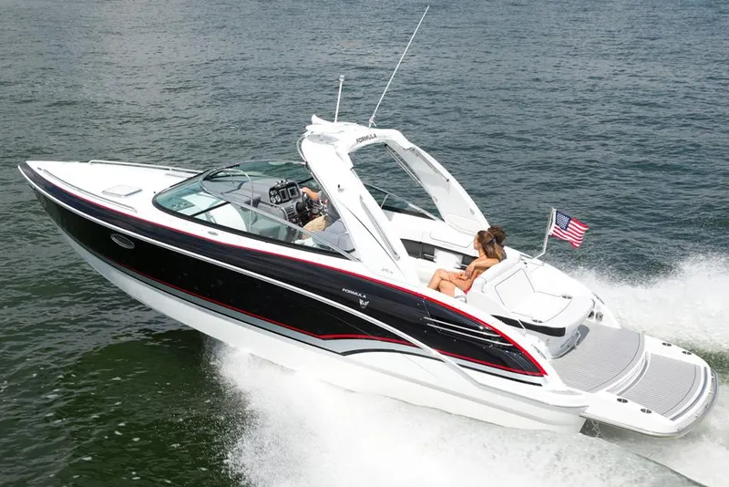 Slide: The Image of Manufacturer Provided Image: 2014 Formula 290 Sun Sport boat cruising on water with passengers. - 21
