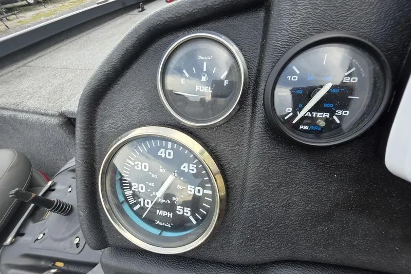 Slide: The Image of Dashboard of 2022 Ranger RT188P boat showing fuel, speed, and water pressure gauges. - 14