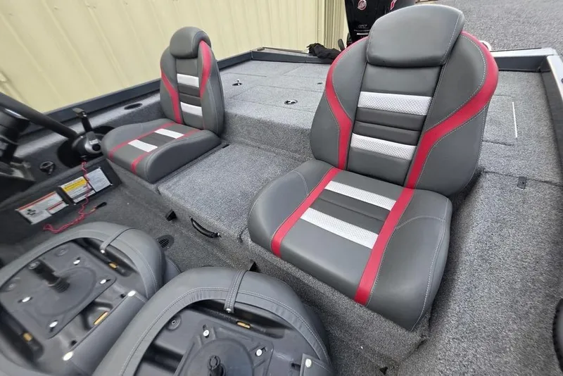 Slide: The Image of 2022 Ranger RT188P boat interior with gray and red seats, showcasing modern design. - 20
