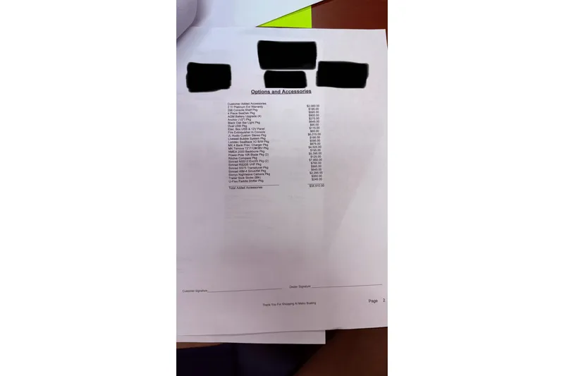 Slide: The Image of 2024 BlackJack 256 Coastal options and accessories list with prices on document. - 10