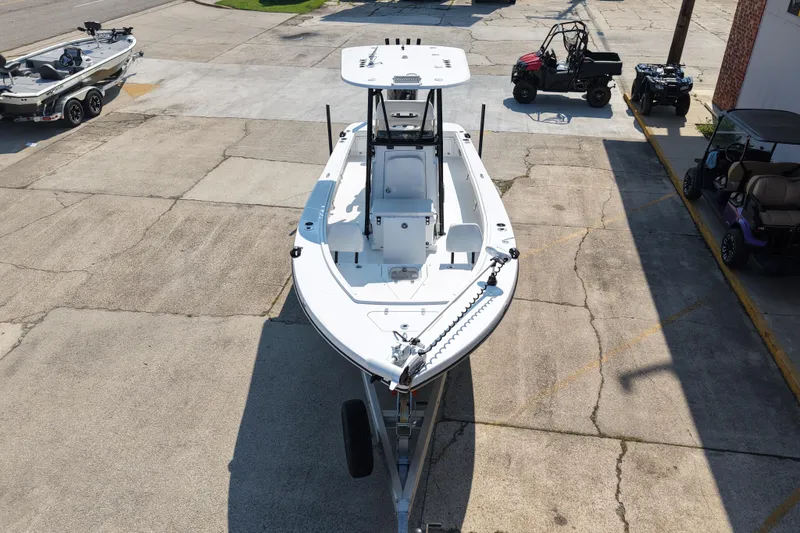 Slide: The Image of 2024 BlackJack 256 Coastal boat on trailer in parking lot, aerial view. - 7