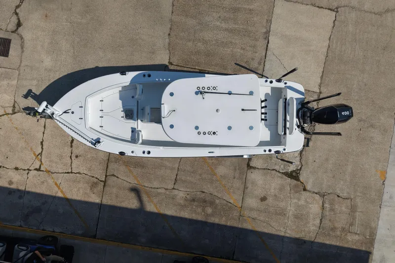 Slide: The Image of Overhead view of 2024 BlackJack 256 Coastal boat on concrete surface. - 9