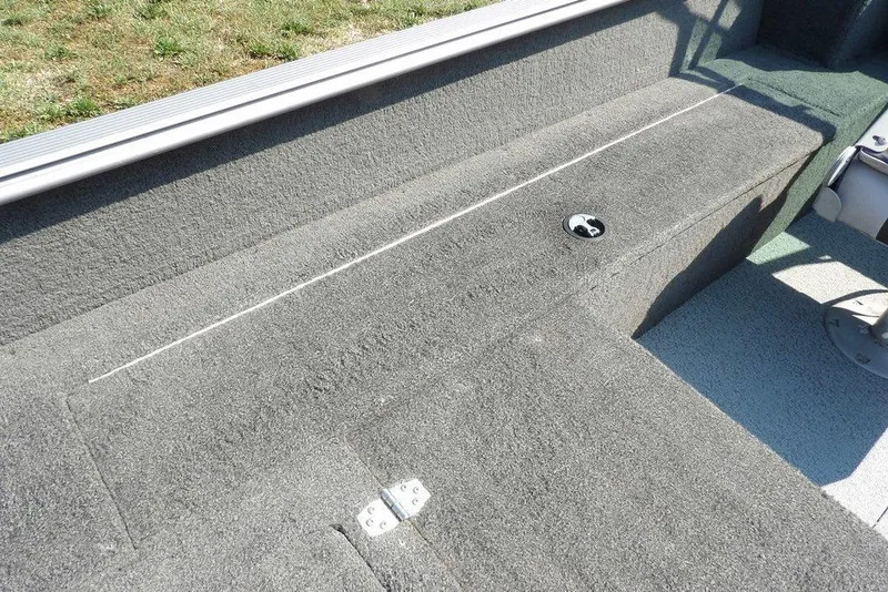 Slide: The Image of Interior view of 2012 Lund 1775 Impact Sport boat with carpeted seating area. - 25