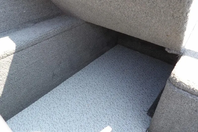 Slide: The Image of Interior storage compartment of a 2012 Lund 1775 Impact Sport boat. - 29