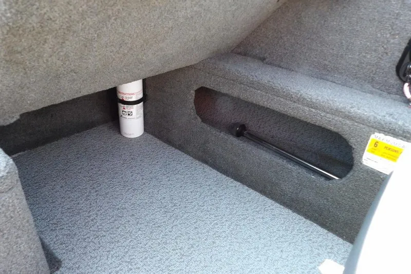 Slide: The Image of Interior storage compartment of 2012 Lund 1775 Impact Sport boat. - 35