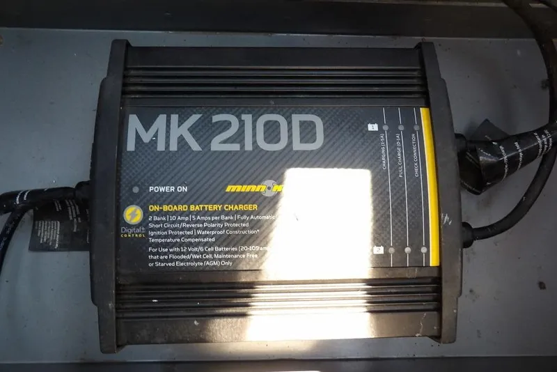Slide: The Image of MK 210D on-board battery charger in a 2012 Lund 1775 Impact Sport boat. - 40
