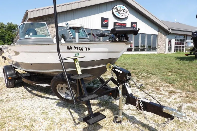 Slide: The Image of 2012 Lund 1775 Impact Sport boat on trailer at White's Marine Center. - 57
