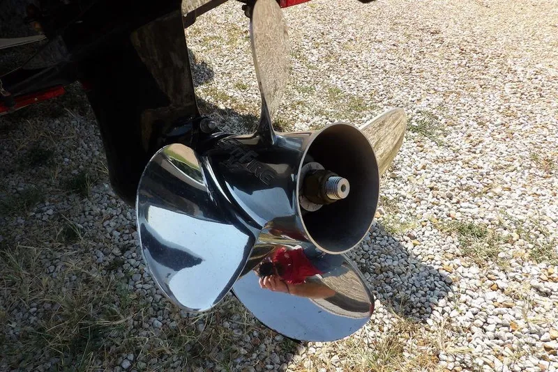 Slide: The Image of Close-up of a shiny boat propeller on a 2012 Lund 1775 Impact Sport. - 64