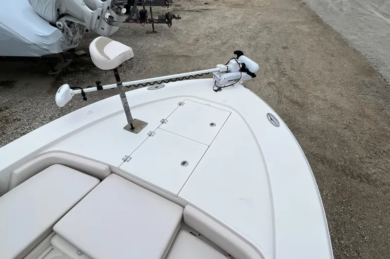 Slide: The Image of 2016 Robalo 246 Cayman boat deck with trolling motor and seating. - 36