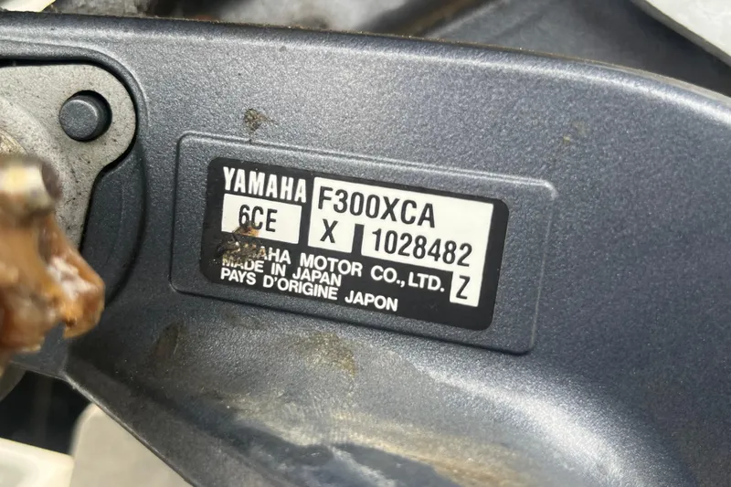 Slide: The Image of Yamaha F300XCA engine label on 2016 Robalo 246 Cayman boat, made in Japan. - 39