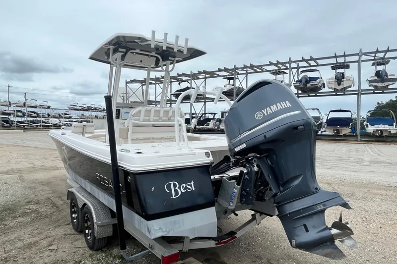 Slide: The Image of 2016 Robalo 246 Cayman boat with Yamaha outboard motor on trailer. - 6