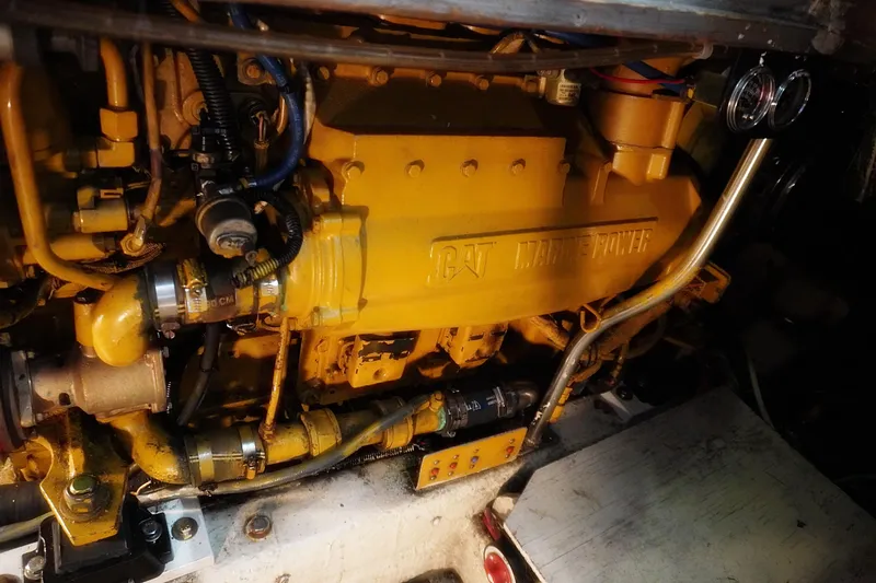 Slide: The Image of Engine of 1986 Ocean Yachts 38 Super Sport, featuring CAT Marine Power components. - 17