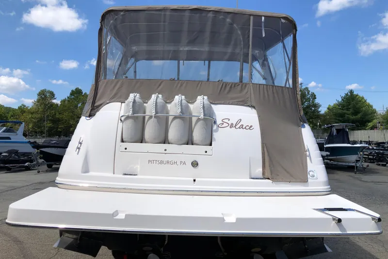Slide: The Image of 2004 Rinker Fiesta Vee 312 boat with canopy, docked in Pittsburgh, PA. - 7