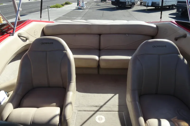 Slide: The Image of Interior of a 2000 Crownline 202 BR LPX boat with beige seating. - 15