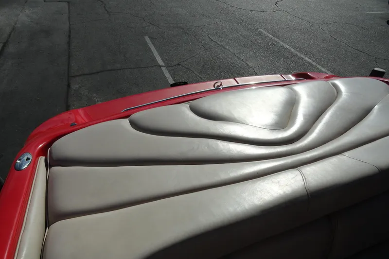 Slide: The Image of Crownline 202 BR LPX 2000 boat with red and beige seating detail. - 17