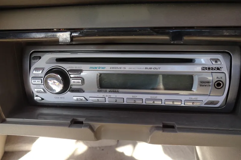 Slide: The Image of Sony marine stereo in a 2000 Crownline 202 BR LPX boat dashboard. - 9