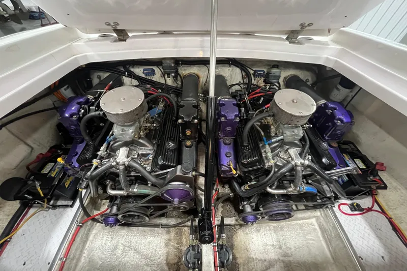 Slide: The Image of 1999 Donzi 28 ZX engine compartment with dual high-performance engines. - 17