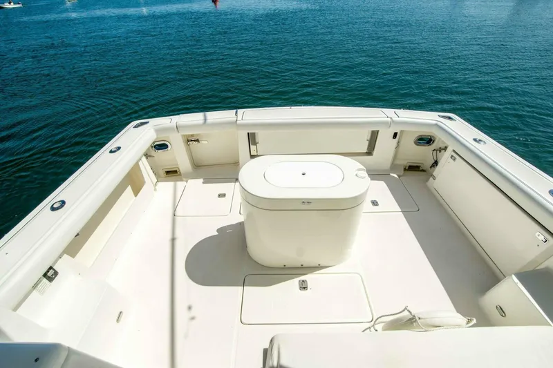 Slide: The Image of Spacious deck of 2000 Tiara 41 Open yacht on calm water. - 20