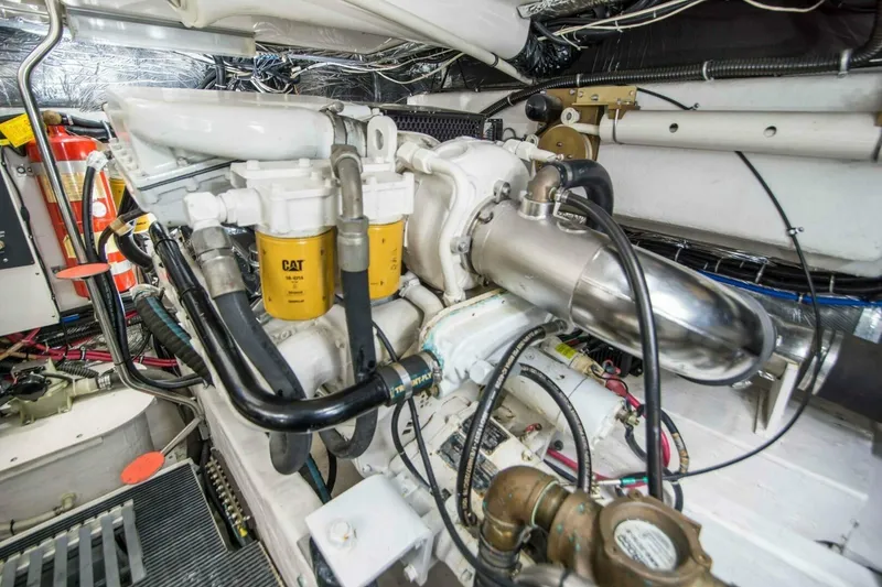 Slide: The Image of Engine room of 2000 Tiara 41 Open yacht with CAT filters and exhaust system. - 31