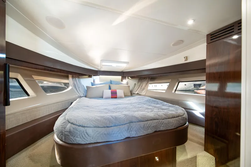Slide: The Image of Luxurious cabin interior of 2016 Sea Ray 400 Sundancer yacht with cozy bed. - 25