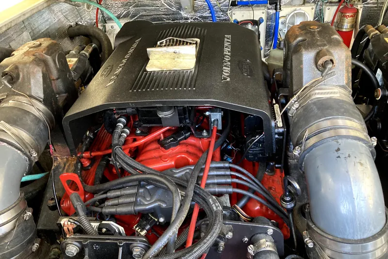 Slide: The Image of Engine compartment of a 2002 Albemarle 28 Express boat, featuring a Yanmar diesel engine. - 10