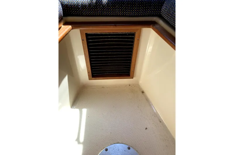 Slide: The Image of 2002 Albemarle 28 Express cabin interior with vent and carpeted floor. - 13