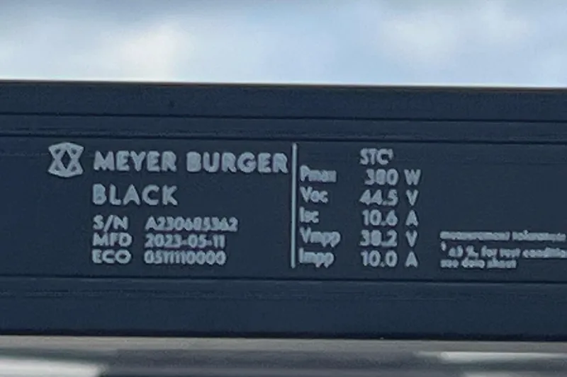 Slide: The Image of Label on Meyer Burger Black solar panel, showing specifications and serial number. - 10