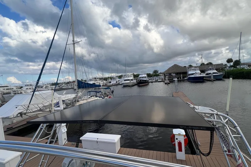 Slide: The Image of Marina view with Catalina 470 sailboat, 1999 model, under cloudy sky. - 9