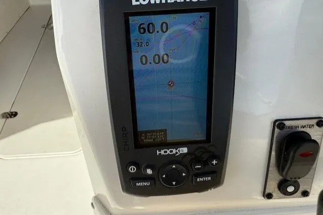 Slide: The Image of Lowrance fishfinder display on 2017 NauticStar 203DC Sport Deck boat. - 8