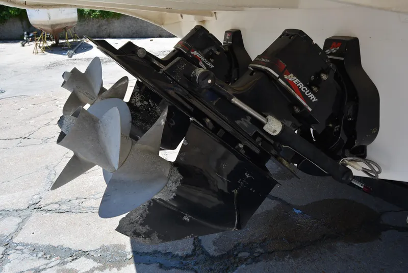 Slide: The Image of Propellers of a 2004 Sea Ray 300 Sundancer boat on dry dock. - 22