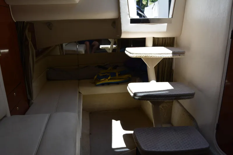 Slide: The Image of Interior cabin of 2004 Sea Ray 300 Sundancer with seating and steps. - 40