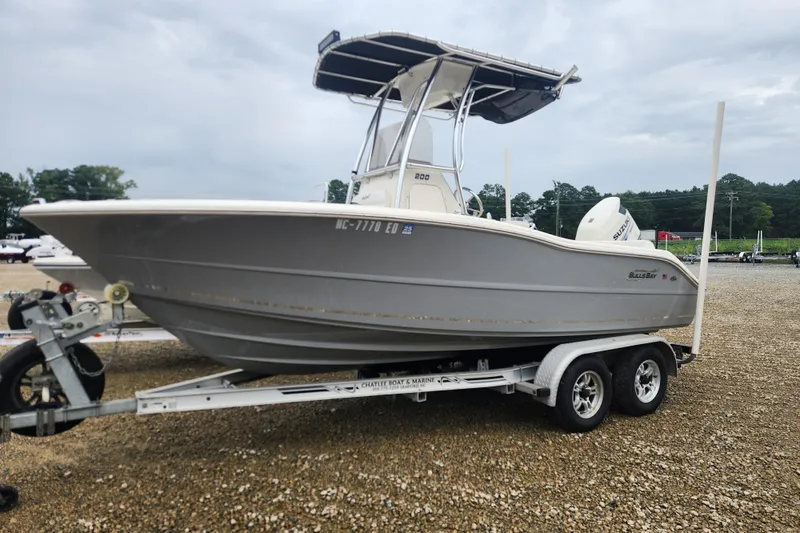 Slide: The Image of 2016 Bulls Bay 200 Center Console boat on trailer in outdoor setting. - 0