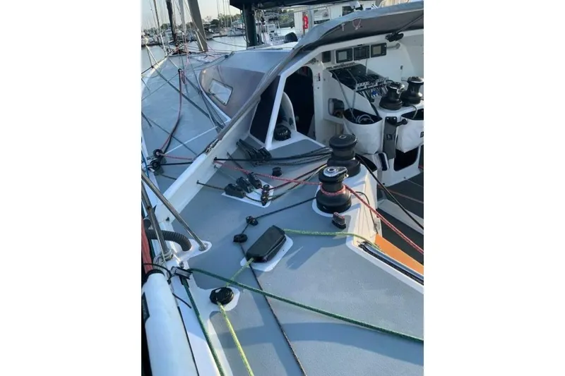 Slide: The Image of 2009 Akilaria RC2 Class 40 sailboat deck with winches and rigging. - 18