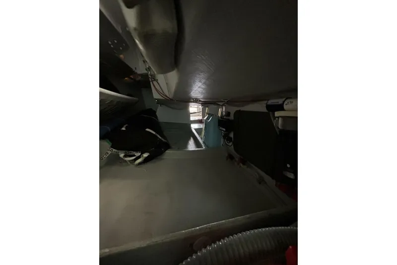 Slide: The Image of Interior view of 2009 Akilaria RC2 Class 40 sailboat, showcasing compact cabin space. - 49