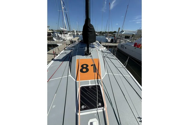 Slide: The Image of Sailboat deck view of 2009 Class 40 Akilaria RC2, docked in marina. - 64