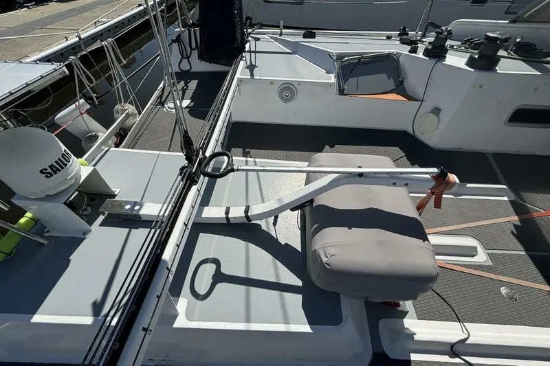 Slide: The Image of 2009 Class 40 Akilaria RC2 yacht deck with steering and rigging details. - 70